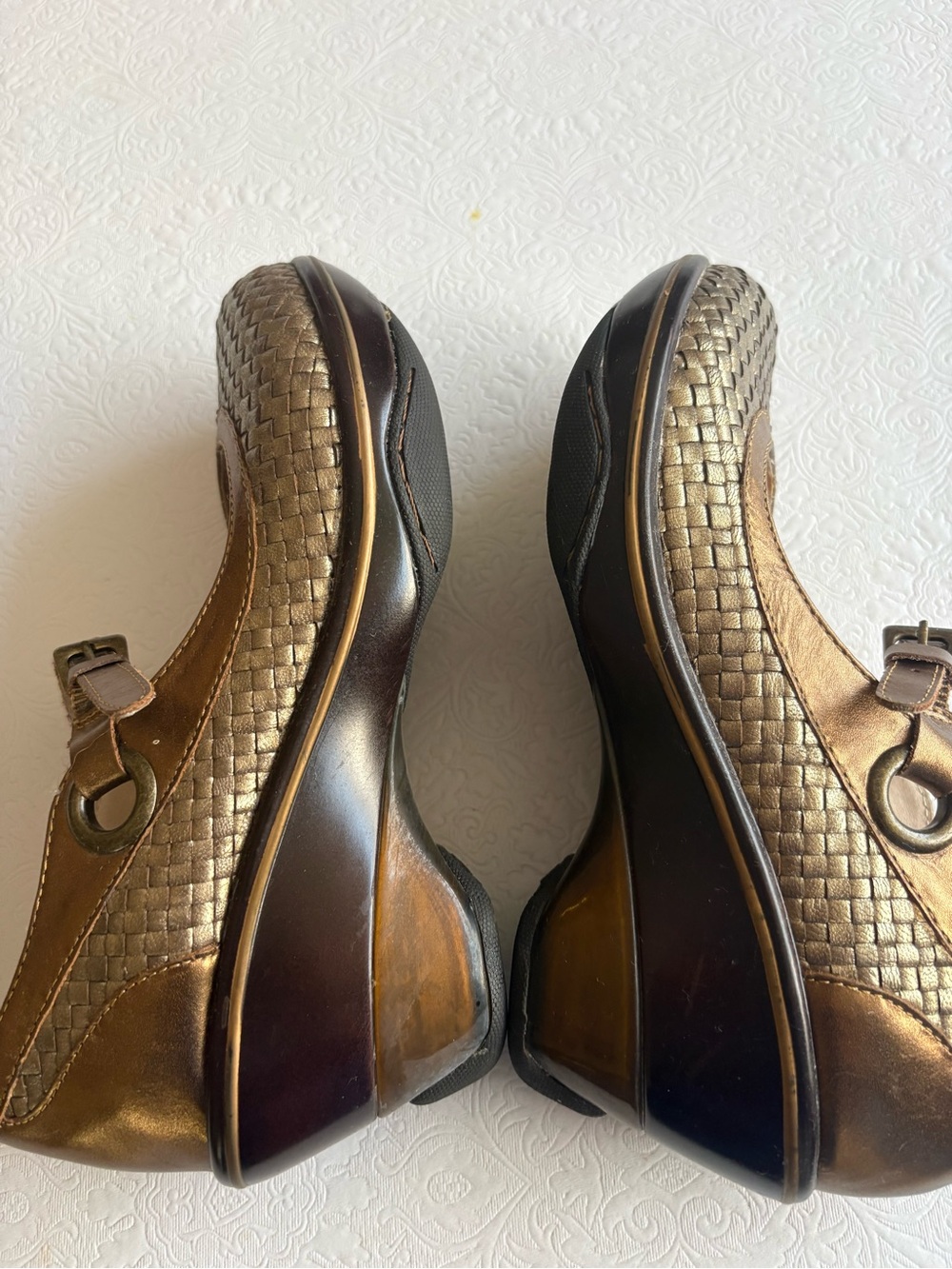 Woman’s Metallic Bronze Slip-On Wedge Shoes